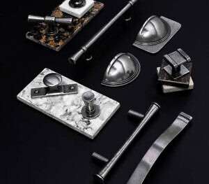 1909 - The natural mottled finish of our Pewter handles bring a unique and endearing character to a space.